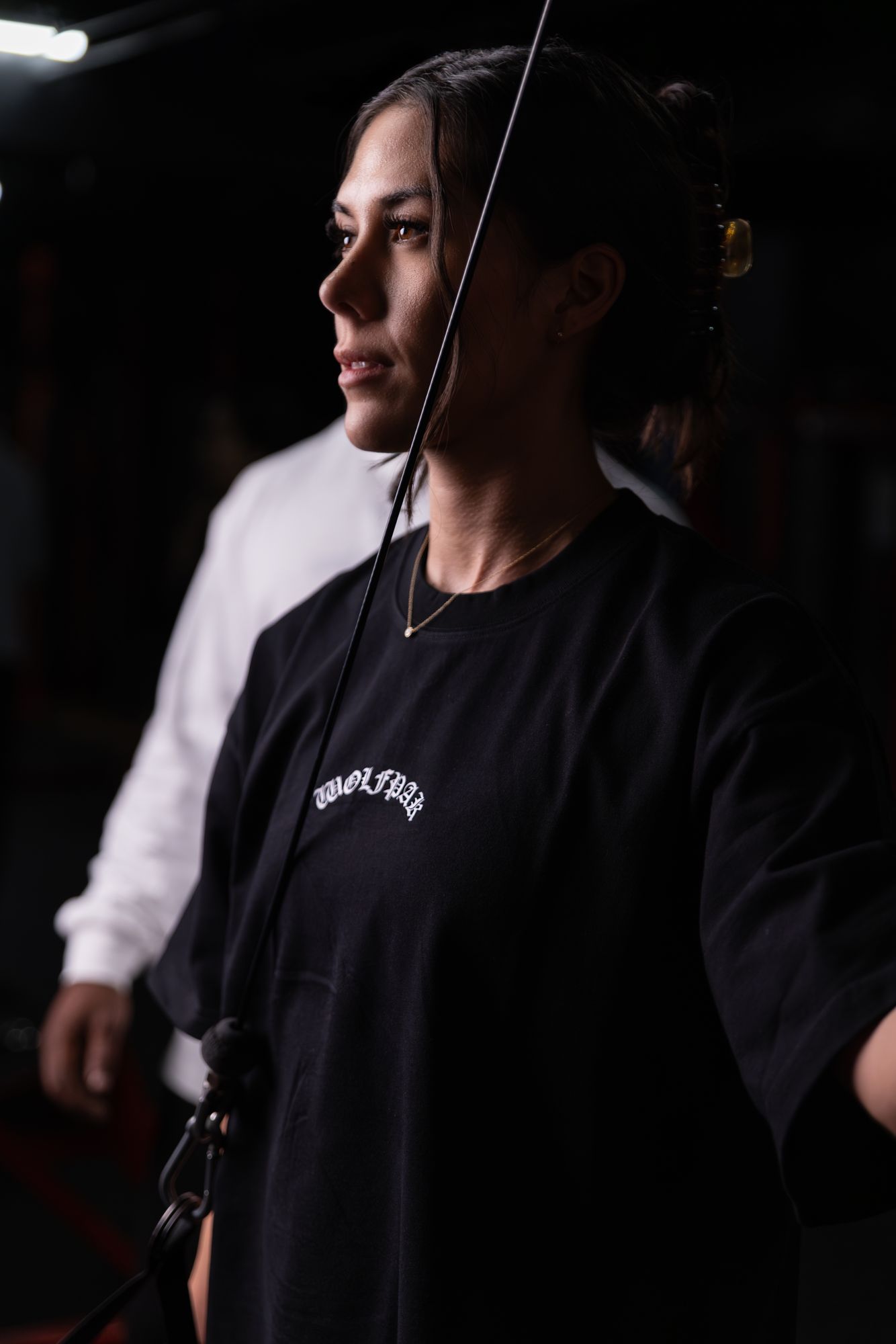 Member focused on the cable station at Legacy Performance Institute