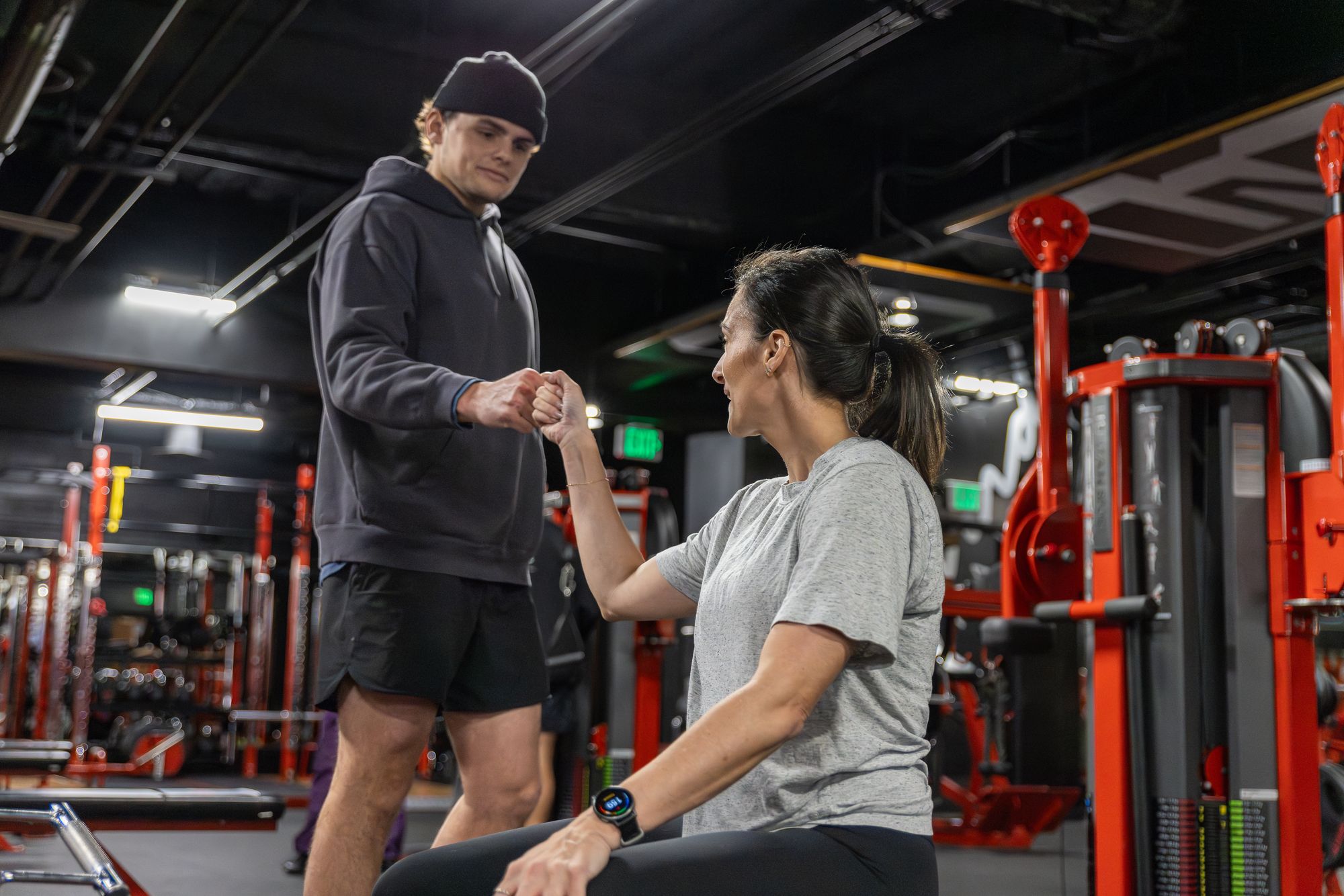 Coach and client on the training floor at Legacy Performance Institute